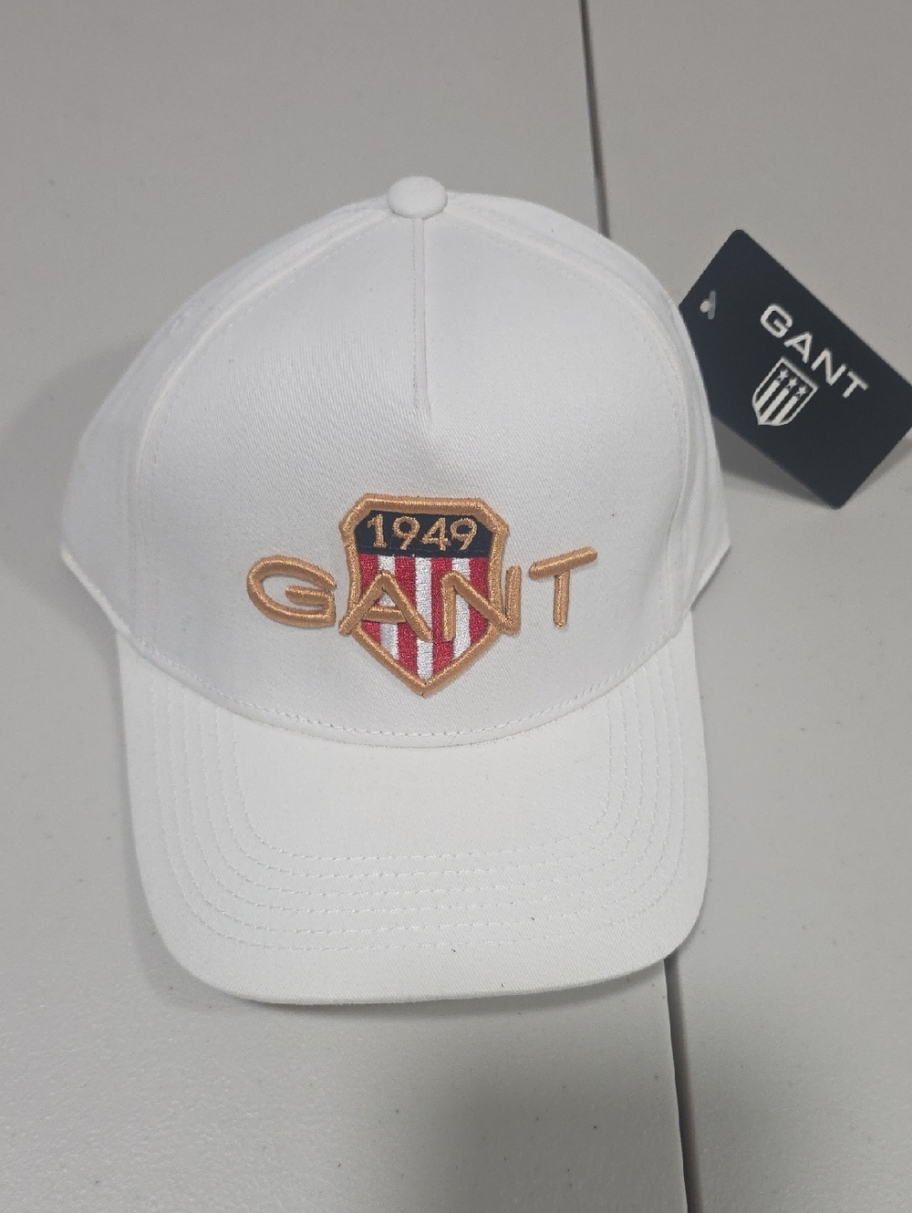 Gant White Cap with Gold Embroidered Shield